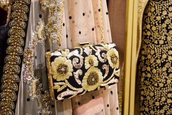 Photo of black embroidered resham work bag in black with white gara kashmiri embroidery