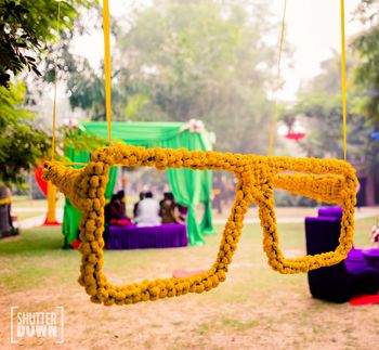genda flower photobooth backdrop for mehendi