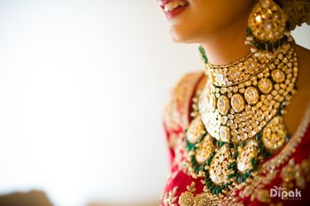 Elaborate bridal necklace with green beads