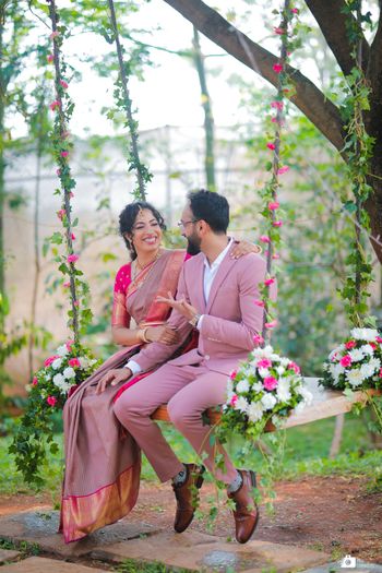 Photo of Candid shot of a bride and groom looking at each other.
