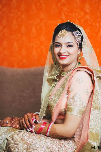 Photo of pastel pink bride