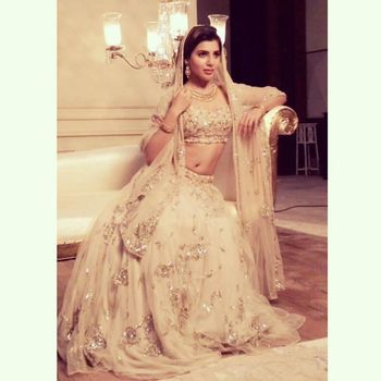 Photo of cream bridal lehenga