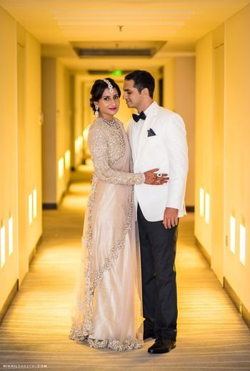 Photo of Light grey embellished saree for reception