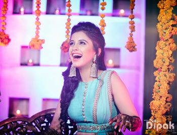 light blue pleated blouse