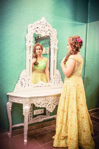 Bride to be posing in the mirror shot