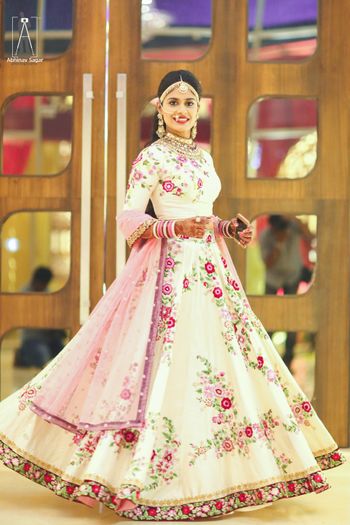 Photo of Engagement Anarkali with floral print on white