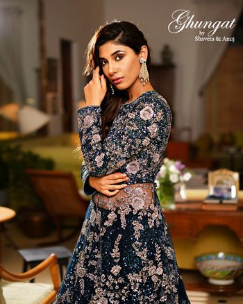 Photo of Teal blue outfit with silver rose motifs