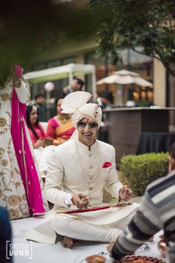 Photo of Monotone groom in all white