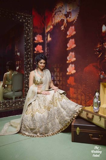 Photo of gold and white lehenga