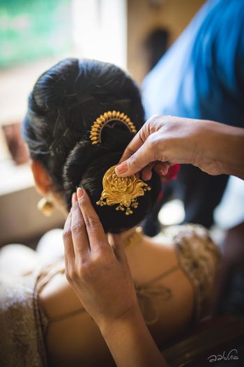 Pretty gold hair ornaments for the bridal bun