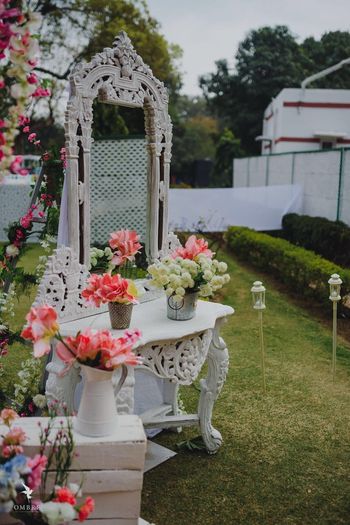 Photo of Beautiful white wood decor with colourful floral decor