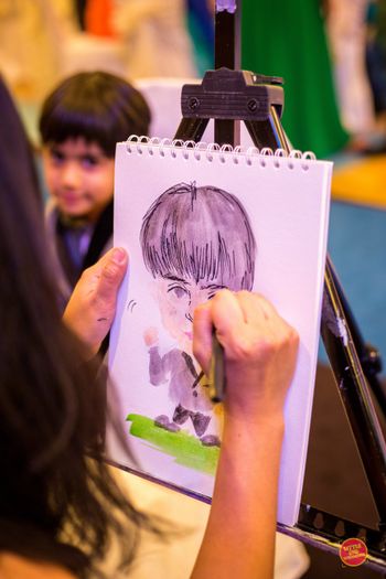 Photo of Mehendi activity idea caricature artist