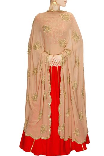red and gold lehenga