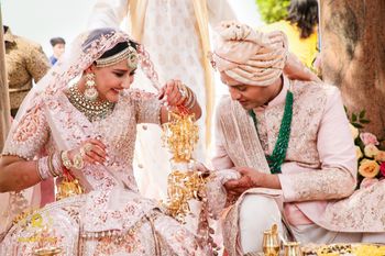 Photo of Pastel twinning bride and groom