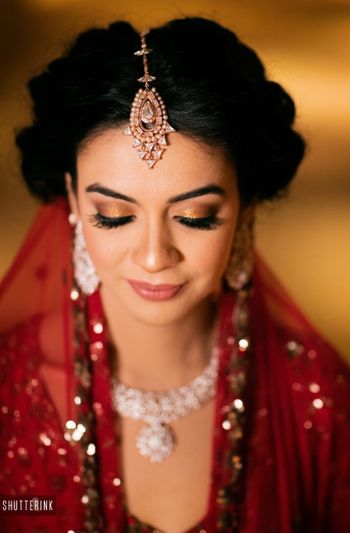 Simple and subtle bridal makeup with gold lids