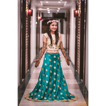 Photo of Bride in turquoise blue mehendi outfit