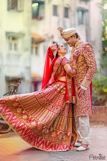 Photo of red and gold lehenga