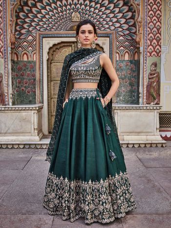 Dark green lehenga with pockets for mehendi or sangeet 
