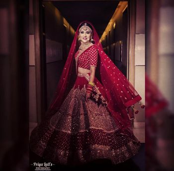 Photo of Red sequin bridal lehenga