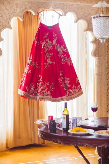 Photo of Getting ready shot with sabyasachi lehenga on hanger
