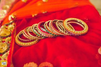 Red Dupatta and Gold Bangles