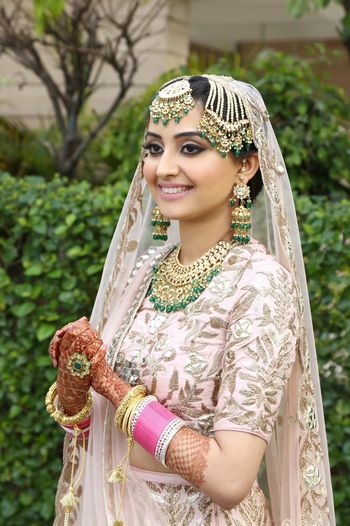 Gold and green bridal jewellery