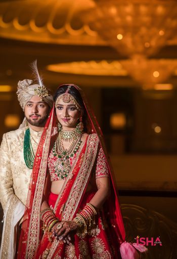 couple portrait on wedding day with bride wearing long rani haar