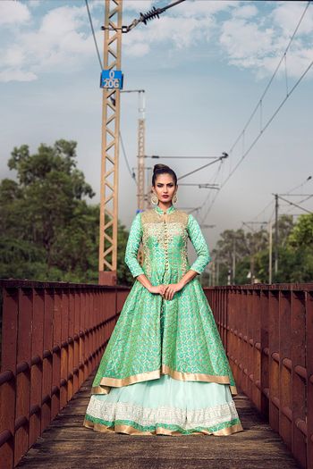 Photo of Mint and Gold Benarasi Lehenga with Long Jacket