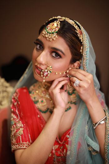 Photo of Getting ready bridal shot.