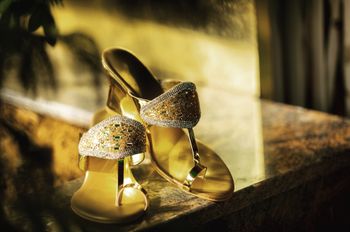 Photo of Gold bridal wedges with stone work