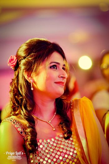 Photo of Light pink makeup and hairstyle for engagement