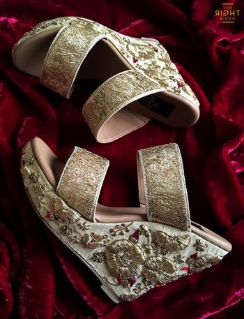 Dull gold high wedges with zardozi work on heel