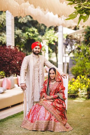 Photo of Colour-coordinated bride and groom.