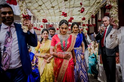 Photo Of A South Indian Bride And Groom Pose In Coordinated Outfits