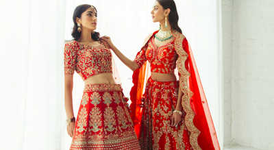 Photo of Red bridal lehengas with intricate detailing
