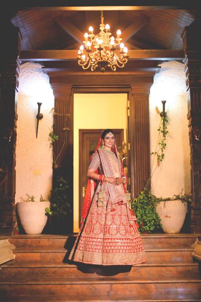 Photo of Stunning bridal portrait under a chandelier on the wedding day