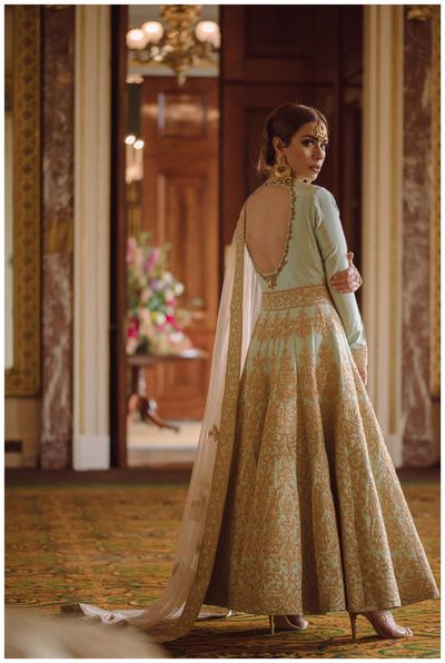 Photo of mint blue and gold anarkali