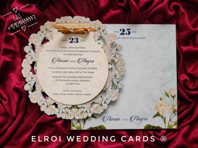 Beautiful floral design round die-cut | Gold foil with two inserts tying knots ribbon | Couple name Engraved and Pasting Gold Aycralic | Cover floral design printed.