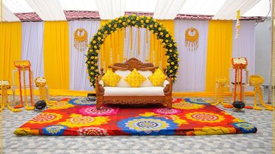 Colors and hues Haldi Decor with a stunning collection of flowers!
