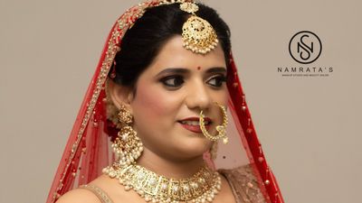 Marwari Bride in beige and red combination attire
