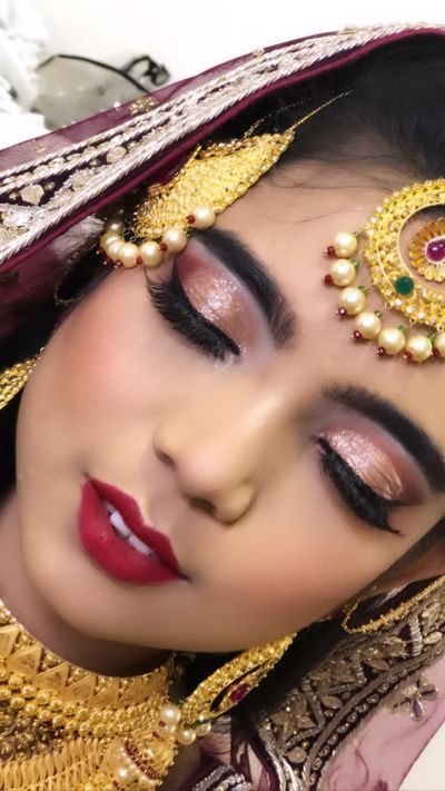 Kashmiri red n gold bridal look 