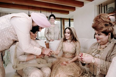 Photo of Chooda ceremony with bride's family before the wedding