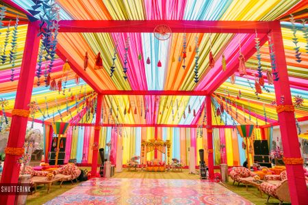 Bright and colorful decor perfect for a mehendi ceremony