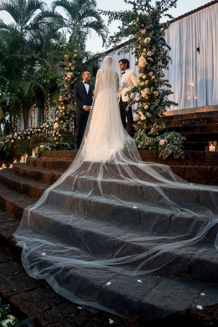 Christian wedding gown with a super long train