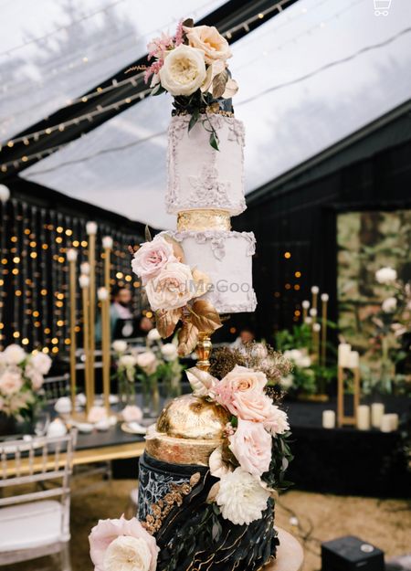 Photo of glam three tier wedding cake idea with florals