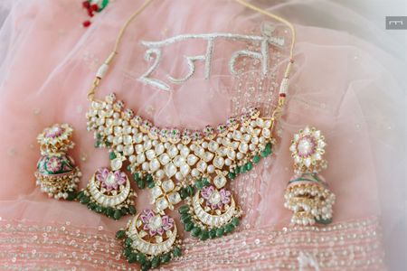 Photo of Beautiful shot of the bridal jewellery in polki work and emeralds for the wedding day
