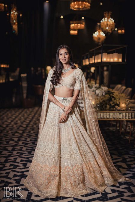 Photo of Reception lehenga in nude and ivory by Falguni Shane Peacock