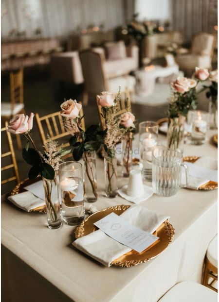 glam gold and white table decor idea for reception