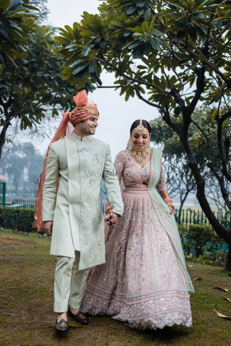 pretty couple photo with both bride and groom in pastel outfits