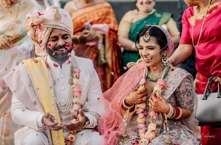 Photo of A happy couple shot in between rituals.